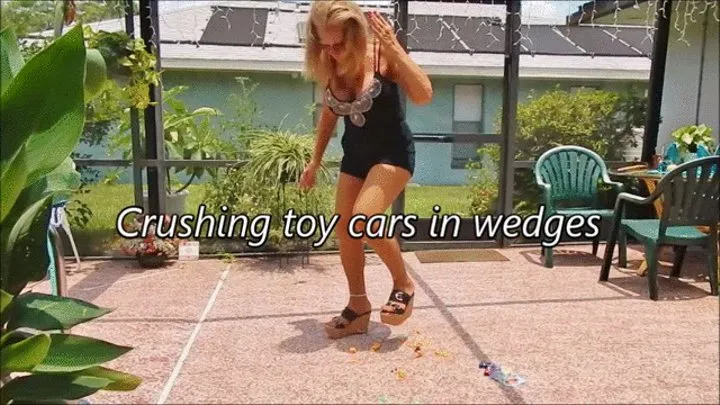 Crushing toy cars in wedges (Fast phone or tablet download)