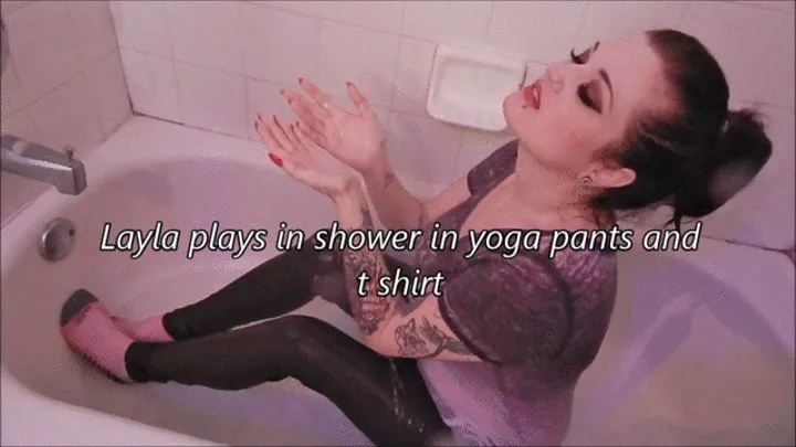 Layla playing in the shower in yoga pants and t shirt