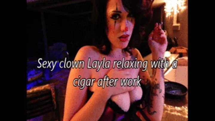 Sexy clown Layla relaxing with cigar after work