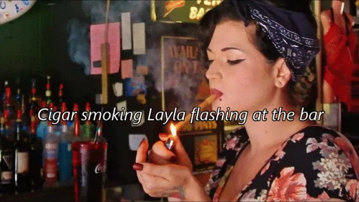 Cigar smoking Layla flashing at the bar