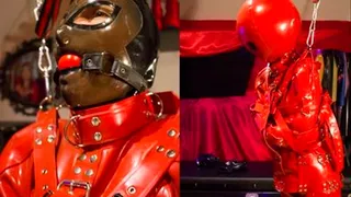 RubberGirl hanging in a lovely red straitjacket