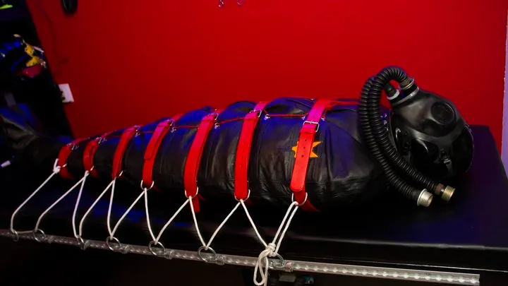 Rubber-Slave bound in the tightest Rubber and Leather Bodybags Top-video