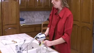 Busty mature gets bent over her kitchen counter and fucked