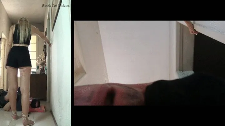 Alice dances over Tom's head wearing flat sandals (pov view)