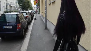 Hot Fetish Girl in Latex Catsuit and High Heels Boots outdoor in the city