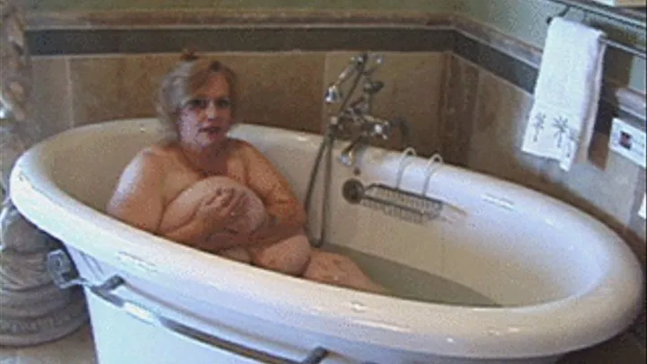 Big titted Suzy Q takes a bath