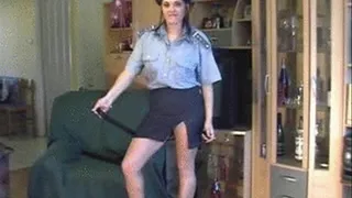 Police officer lady plays with truncheon