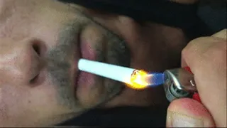 Close up of fetish cub's lips smoking