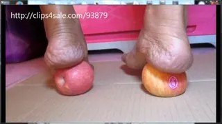 Sara crushing apples with her bare feet