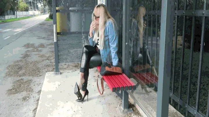 Waiting at the bus stop with a cigarette