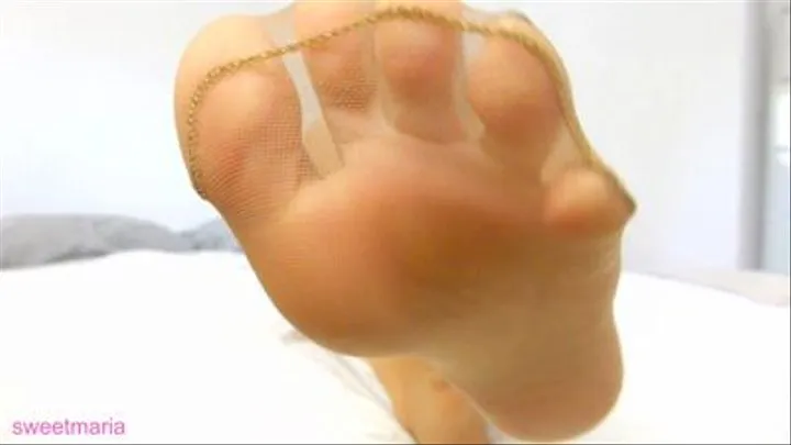 Feet In Silky Suntan Pantyhose