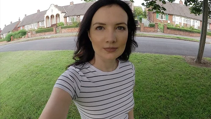 Grey leggings outdoors by the road peeing