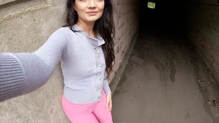 Pink leggings in the underpass peeing
