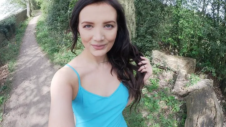 Turquoise dress peeing in the woods