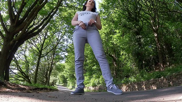 Grey jeans in the road
