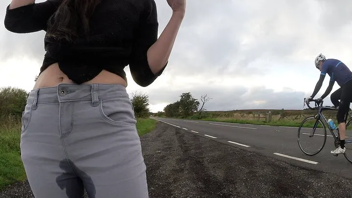 Grey jeans by the road