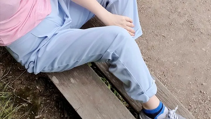 Blue trousers outdoors wetting peeing