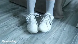 White dirty adidas sneakers