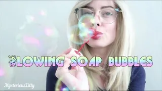 Blowing soap bubbles by Mysterious Lilly