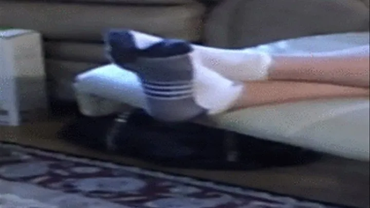 SOCK FEET RUBBING RECLINED SOFA