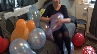 Sophie pops more balloons