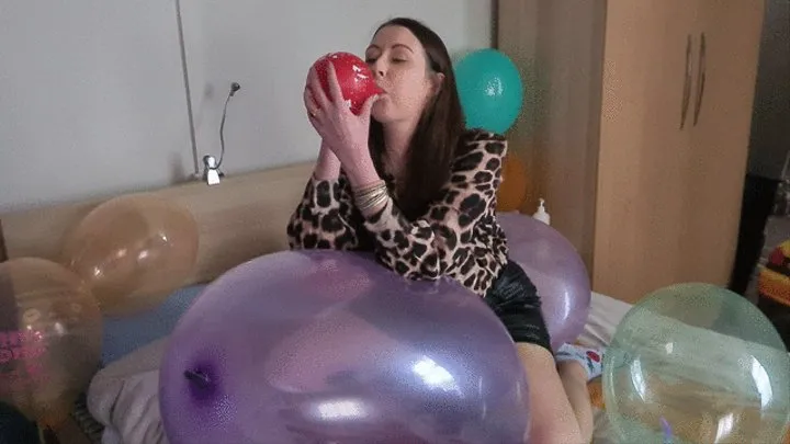 Sophie sit on a big doll balloon, blowing and nails popping Belbal 14