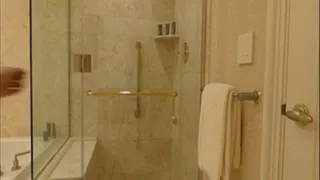 Sammy Showers in a Glass Shower