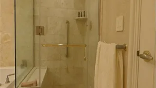 Sammy Showers in a Glass Shower and Sucks a Realistic Dildo