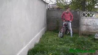 Pissing in the backyard on a cold day, and leaving on her bike