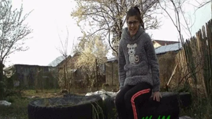 (1024 px) Peeing on some old tires in the yard