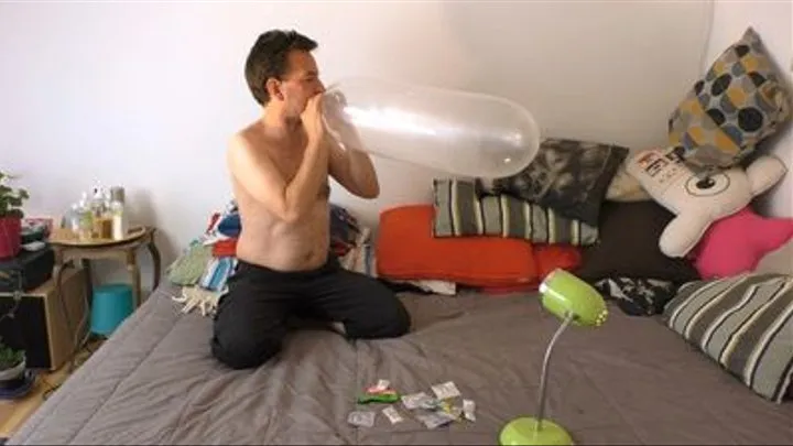 D tries to blow a condom to pop but can't