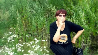 Milf Coughs And Smokes In The Forest