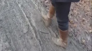 Mud and brown rubber boots
