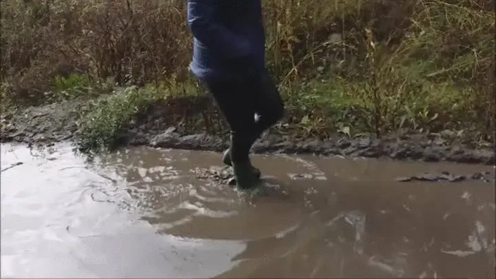 Green rubber boots, both parts together