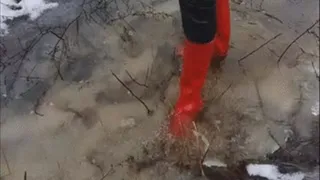 Rubber boots in ice water