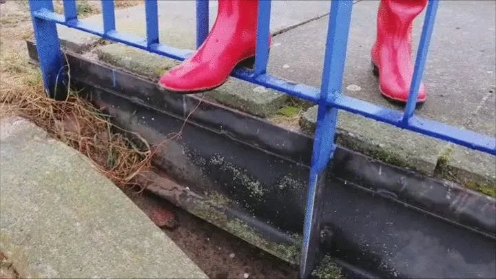 Black latex and red rubber boots