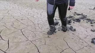 Knee boots soiled in mud