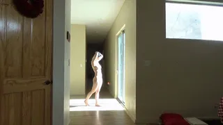 Nude in front of sliding doors