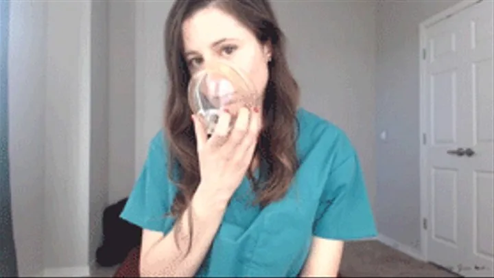 Nurse Playing With Anesthesia Mask