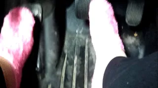 Driving in pink sock slippers