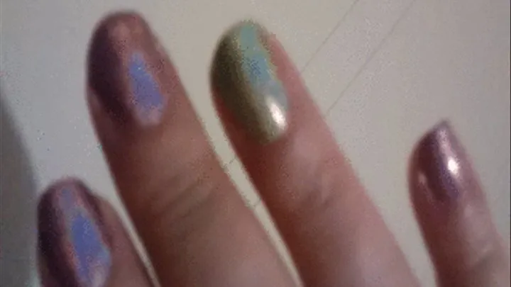 Halo rainbows moving across my fingernails