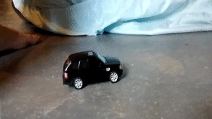 Crushing metal toy suv