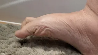 Cracking and wiggling toes side view