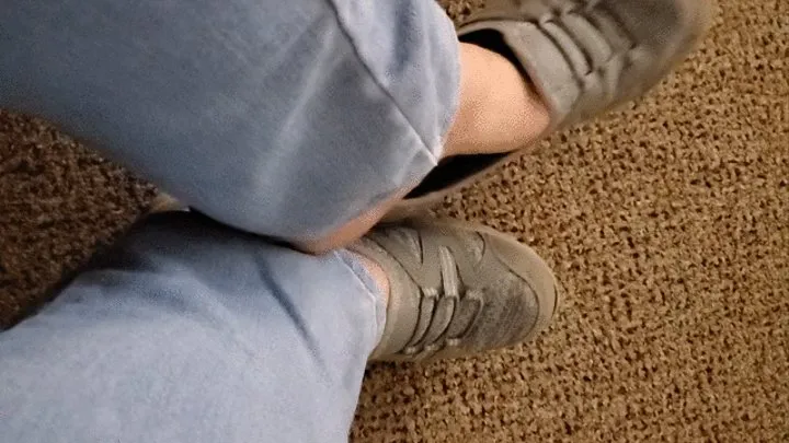 Office dangling grey sneakers