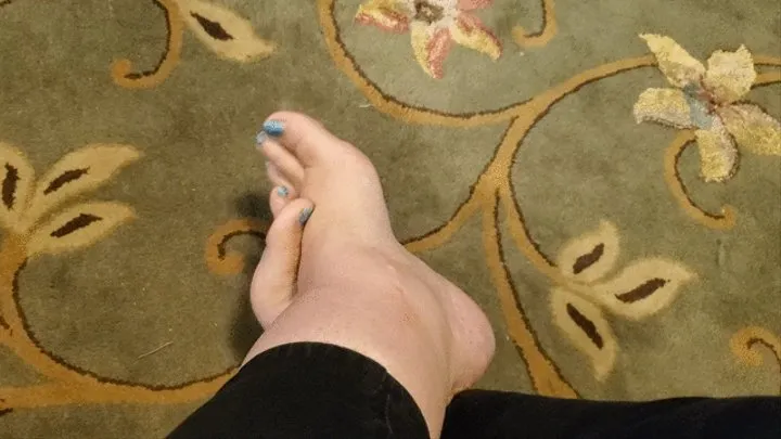 Wiggling toes with ankles crossed