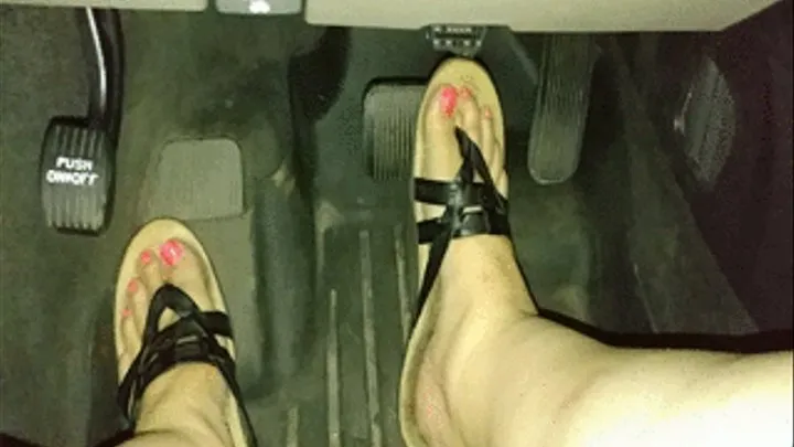 Neon pink toes pressing pedals