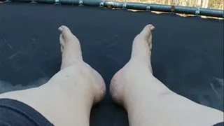 Posing feet on trampoline