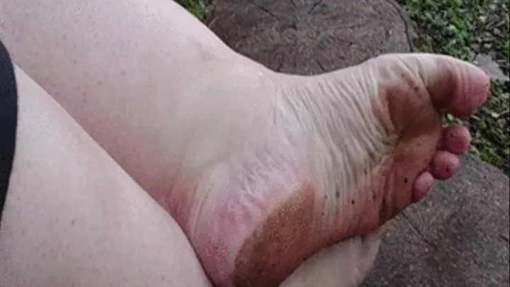 Dirty dirty wrinkled soles in nature