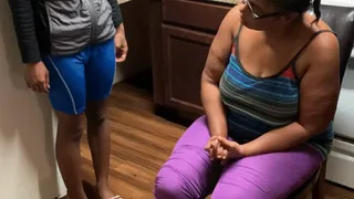 Girl gets spanked over the knee for not cleaning the kitchen