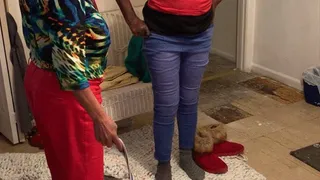 Woman gets a belt spanking for wearing mismatched socks